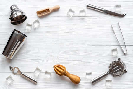 Cocktail bar utensils and tools with shaker, strainer and iceの写真素材