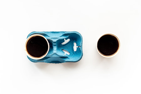 Top view of black coffee in paper cups