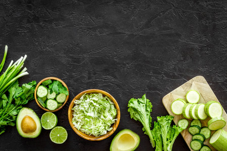 Cooking fresh salad with green vegetables. Raw food diet