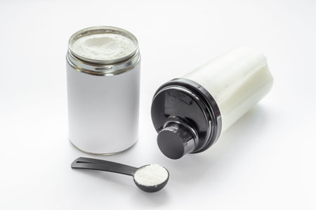 Sport nutrition - whey protein powder and shaker with protein smoothieの写真素材