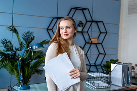 Portrait of blonde business woman at the officeの写真素材