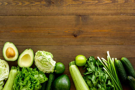 Group of fresh green vegetables. Raw food diet. Top viewの写真素材