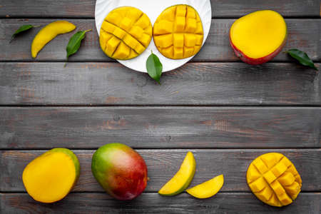 Mango slices and cubes in plate for fresh summer dinnerの写真素材