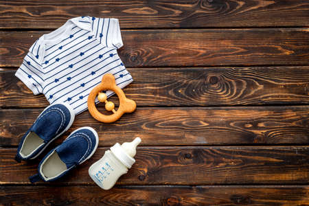 Set of baby boy accessories with milk bottleの写真素材
