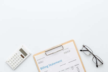 Medical billing statement with calculator. Payment for hospital serviceの写真素材