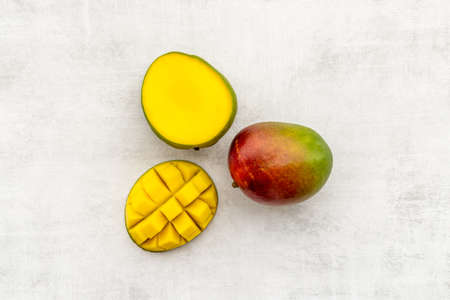 Mango fruit slices and cubes. Tropical fruits layoutの写真素材