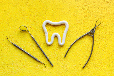 Dental equipment tools with toothpaste, top view. Dental care and oral hygiene conceptの写真素材