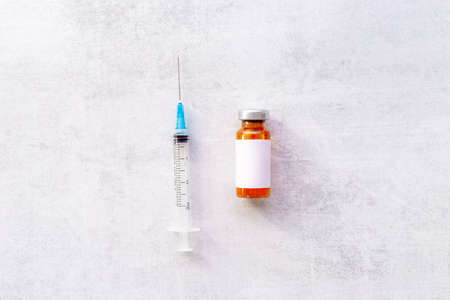 Medical glass vial vaccine and syringe. Vaccination conceptの写真素材
