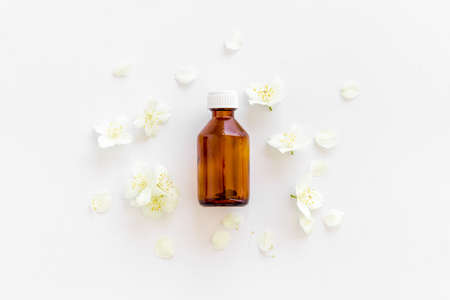 Essential aroma jasmine flowers oil for perfume or massageの写真素材