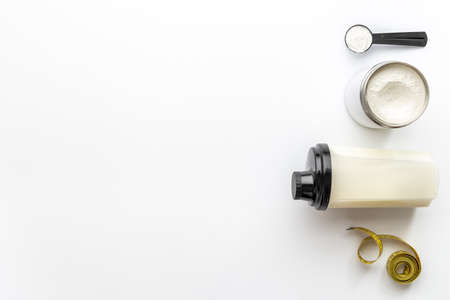 Sport nutrition - whey protein powder and shaker with protein smoothieの写真素材