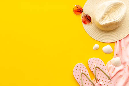 Tropical pattern top view. Beach accessories with sraw hat with sunglassesの写真素材
