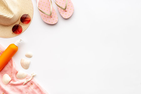 Layout of beach accessories with sraw hat, sunglasses and flip flopsの写真素材
