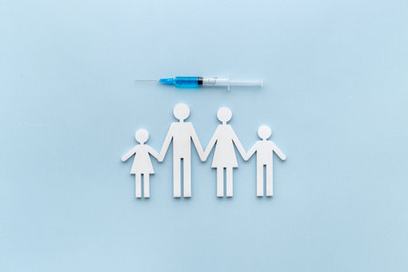 Inject the vaccine for family. Coronavirus vaccine in syringeの写真素材