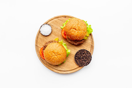 Top view of sandwiches with chicken burger and sliced onionの写真素材