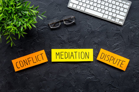 Word mediation on sticky notes on office table. Conflict resolving conceptの写真素材