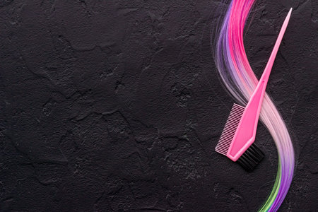 Hairdresser tools for hair dye - brush and strand of hair