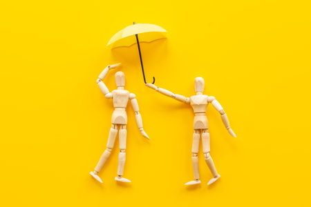 Two wooden figure connection - emotional communication conceptの写真素材