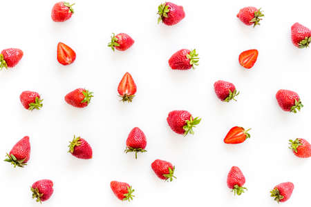 Group of ripe strawberries with green leaves. Flat layの写真素材