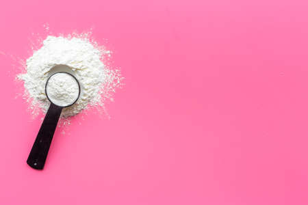 Sport whey protein powder in scoop. Sport nutritionの写真素材