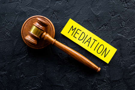 Word mediation with judge gavel. Conflict and dispute resolve conceptの写真素材