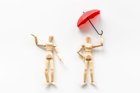 Mental and emotional gender difference between man and woman. Two wooden mannequin figurine connectionの写真素材