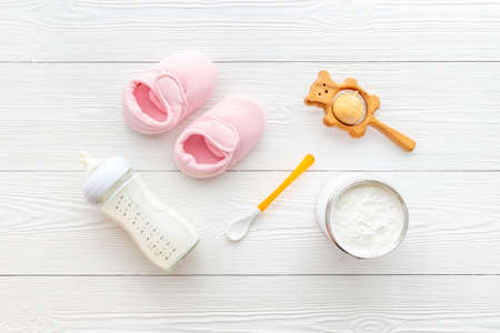 Powdered baby milk and milk formula in bottleの写真素材