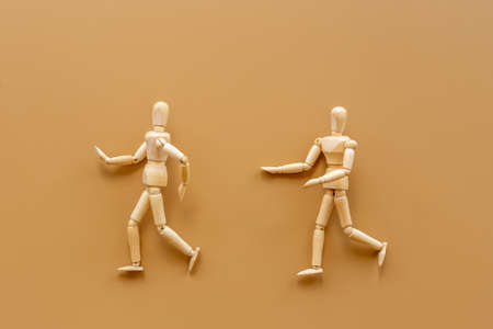 Man and woman connection. Couple of wooden mannequin figures.の写真素材