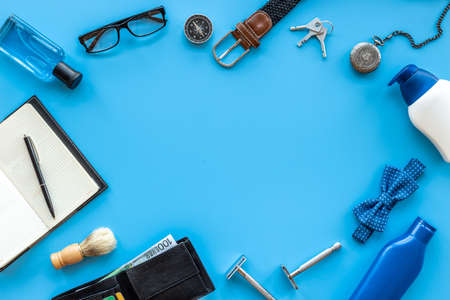 Man accessories on male working space office table. Top viewの写真素材