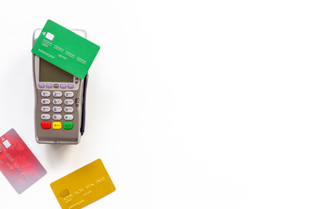 Pos payment terminal with credit card. Paying for shopping. E-commerce and business