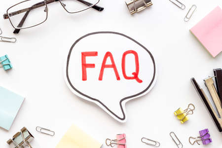 Faq - frequently asked questions - text on paper bubble, top viewの写真素材