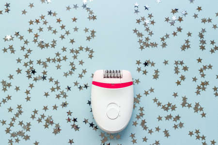 White modern epilator for hair removal. Depilatory overhead viewの写真素材