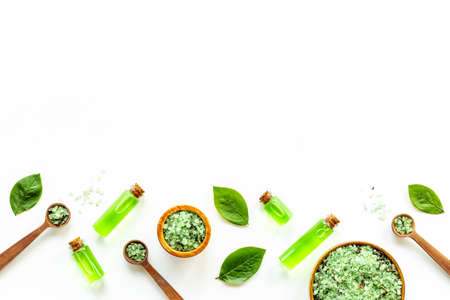 Cosmetic products with tea aroma oil and green leavesの写真素材