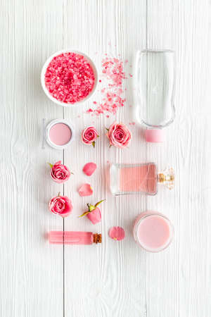 Pink roses cosmetic set with aroma oil and flower perfumeの写真素材