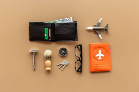 Male traveler outfit and accessories for vacation. Layout top viewの写真素材