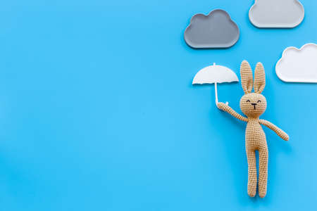 Knitted toy easter bunny for newborn baby or baby showerの写真素材