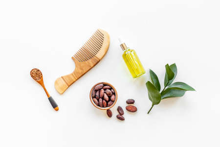 Hair treatment by cocoa oil with hair comb. Top viewの写真素材