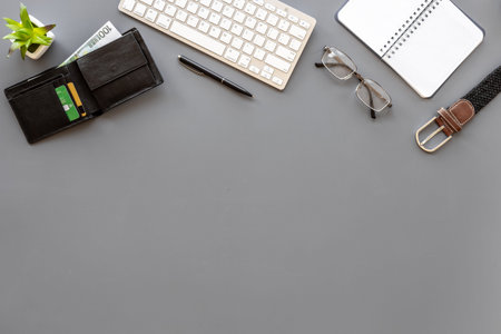 Outfit of business man with male accessories on office tableの写真素材