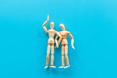 Mental and emotional gender difference between man and woman. Two wooden mannequin figurine connectionの写真素材