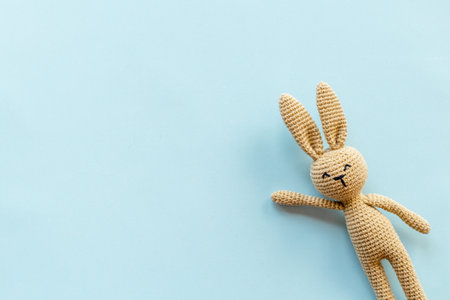 Plush toy rabbit for newborn baby - background for baby showerの写真素材