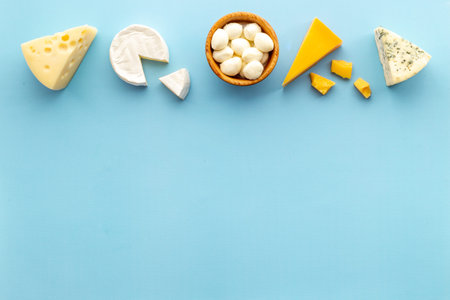 Brie and blue cheese with parmesan and maasdam. Dairy products layoutの写真素材