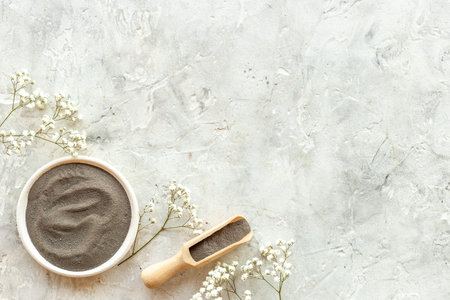 Clay mud cosmetic mask in bowl for spa beauty treatment