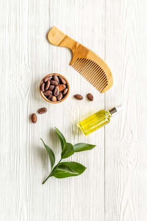 Hair treatment by cocoa oil with hair comb. Top viewの写真素材