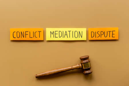 Mediation word with judge gavel. Business diplomacy conflict resolve conceptの写真素材