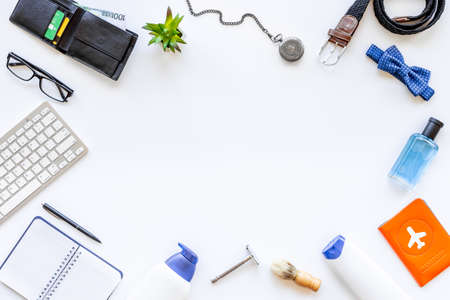 Outfit of business man with male accessories on office tableの写真素材