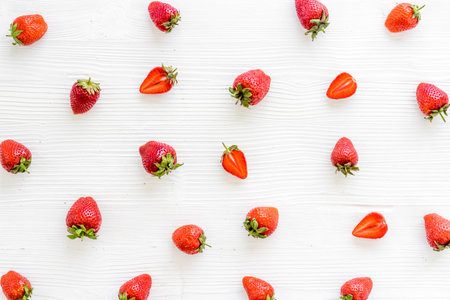 Strawberry pattern with leaves. Food berries flat lay top viewの写真素材