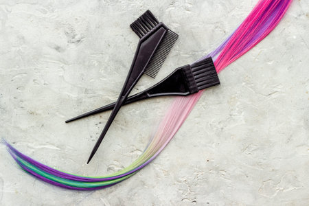 Hairdresser tools for hair dye - brush and strand of hairの写真素材
