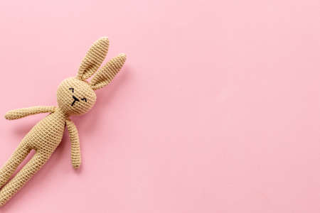 Knitted toy easter bunny for newborn baby or baby showerの写真素材
