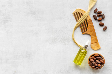 Hair treatment by cocoa oil with hair comb. Top viewの写真素材