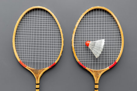 Flat lay of badminton rackets and shuttlecock. Top view