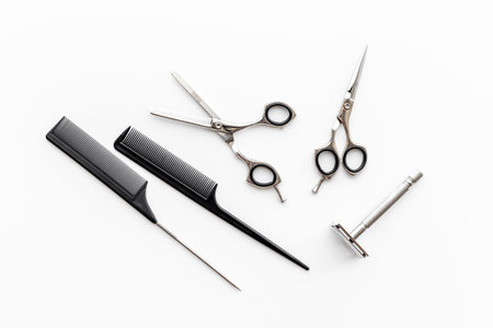 Barber tools with hairdressing scissors and combsの写真素材